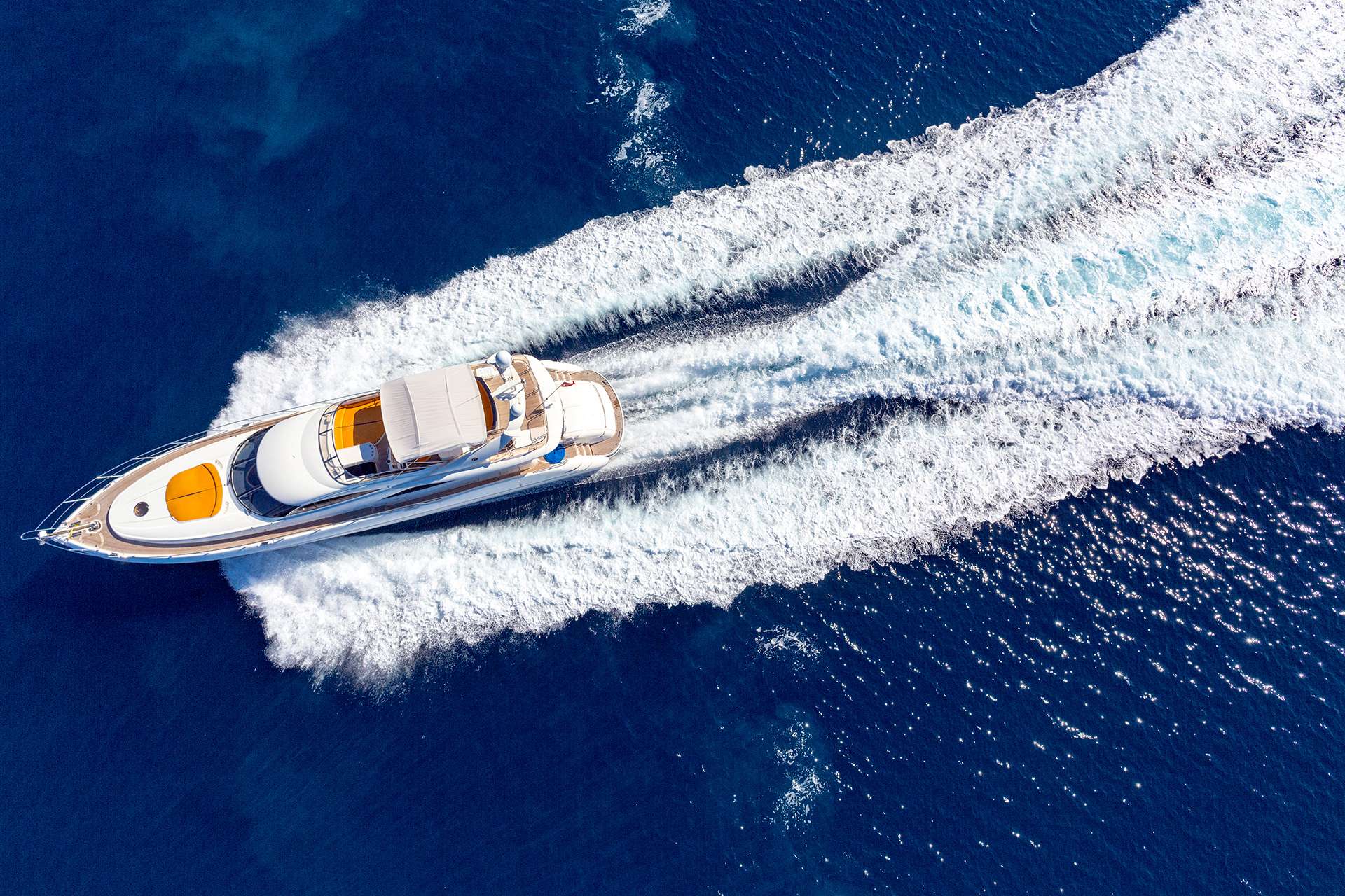 An image from above of a luxury power yacht
